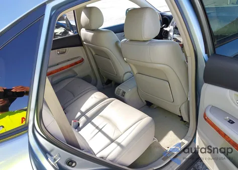 2009 Lexus Rx z USA, uszkodzony, nr VIN 2T2HK31U19C115317